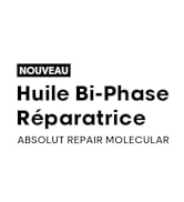 Le texte se lit comme suit : « NOUVELLE Huile Bi-Phase Réparatrice ABSOLUT REPAIR MOLECULAR » sur fond blanc avec texte noir.