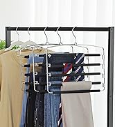 Porte-pantalons à plusieurs niveaux avec plusieurs paires de jeans, pantalons et cravates bien organisés. Le cintre est fixé à un cadre sombre, probablement une tringle de placard